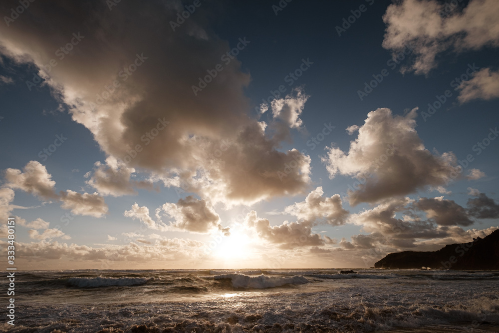 Sunset, clouds, beach and sea