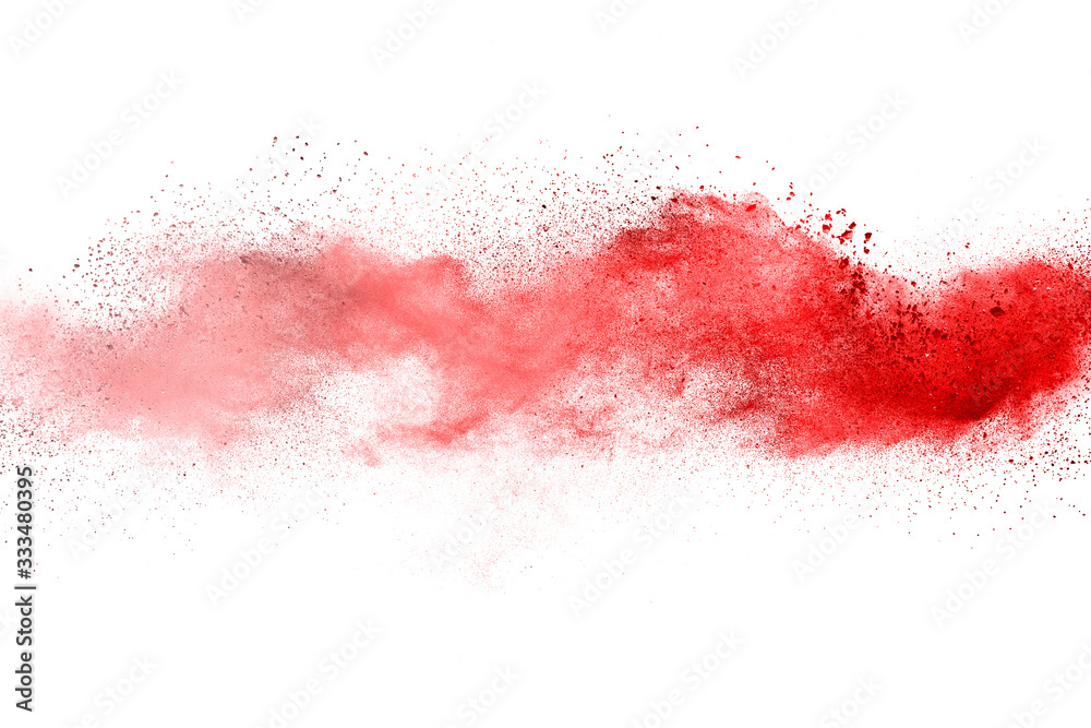 Red powder explosion on white background. Colored cloud. Colorful dust explode. Paint Holi.