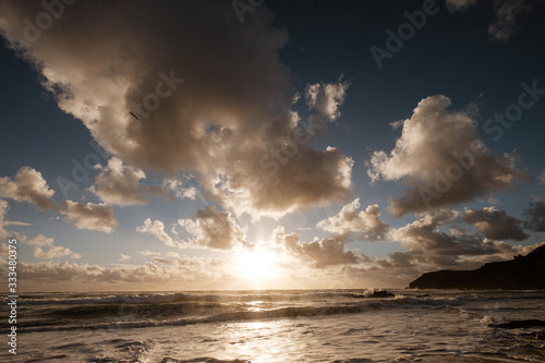 Sunset, clouds, beach and sea