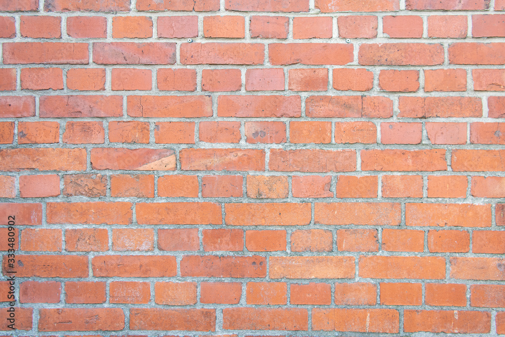 Obraz premium Tło starego ceglanego muru ze zniszczonych cegieł