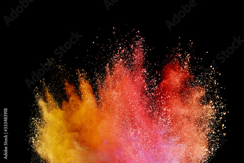Freeze motion of colorful color powder exploding on black background. Paint Holi.Indian festival Holi
