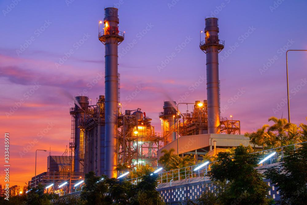 Obraz premium Natural Gas Combined Cycle Power Plant with sunset and light orange
