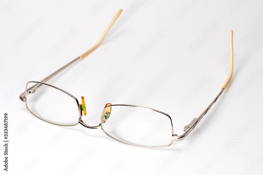 Glasses on isolated white Optic glasses. close up Glasses on isolated white Optic glasses. close up