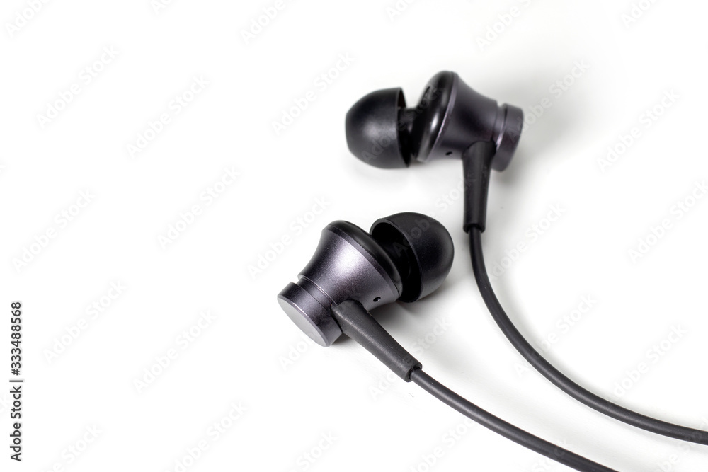 Flat lay concept: headphones on white backgrounds Flat lay concept: headphones on white backgrounds