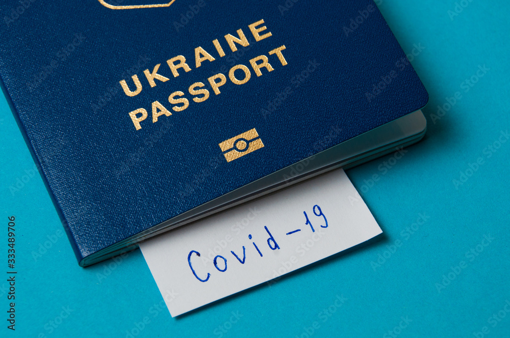 Coronavirus and travel concept. Note the coronavirus COVID-19 and passport. A new outbreak of the corona virus. Coronavirus and travel concept. Note the coronavirus COVID-19 and passport. A new outbreak of the corona virus.