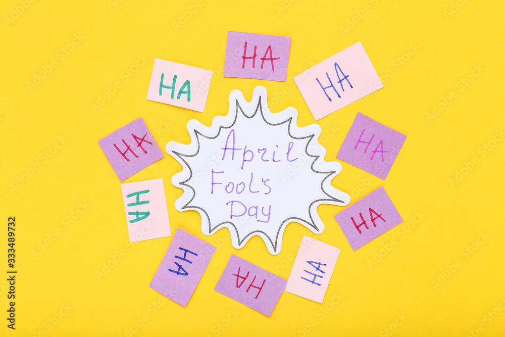 Text April Fool's Day on yellow background Text April Fool's Day on yellow background
