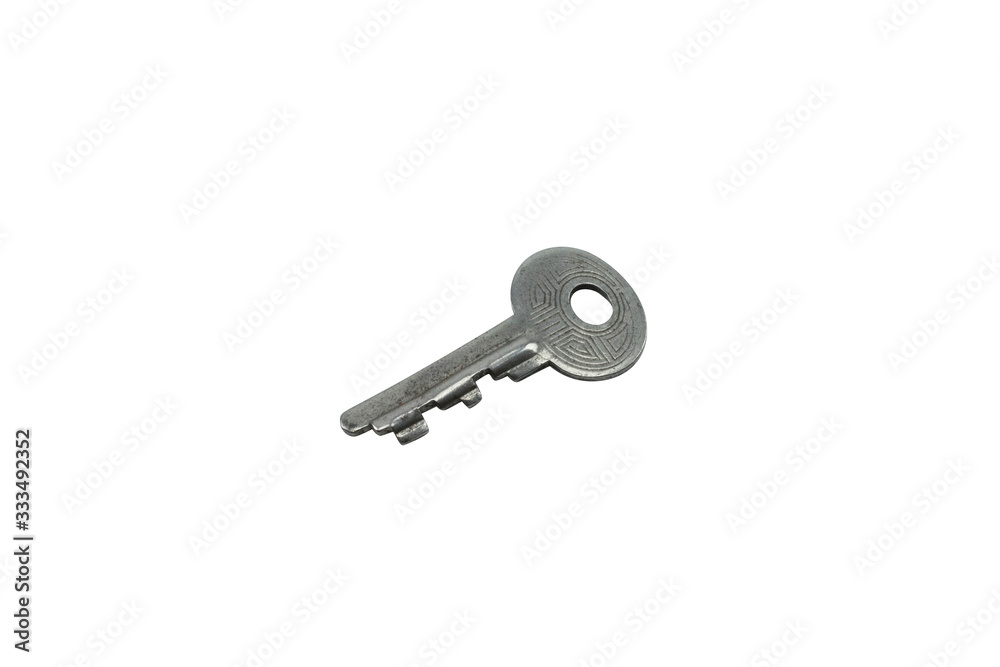 A small, silver, old jewelry box key, close up, isolated on a clean, white background. Shot in macro. A small, silver, old jewelry box key, close up, isolated on a clean, white background. Shot in macro.