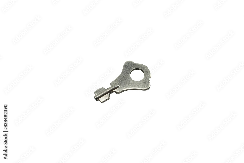 A old, rusty diary key, close up, isolated on a clean, white background. Shot in macro. A old, rusty diary key, close up, isolated on a clean, white background. Shot in macro.
