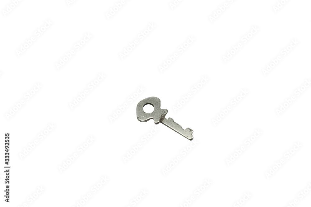 A old, metal padlock key, close up, isolated on a clean, white background. Shot in macro. A old, metal padlock key, close up, isolated on a clean, white background. Shot in macro.