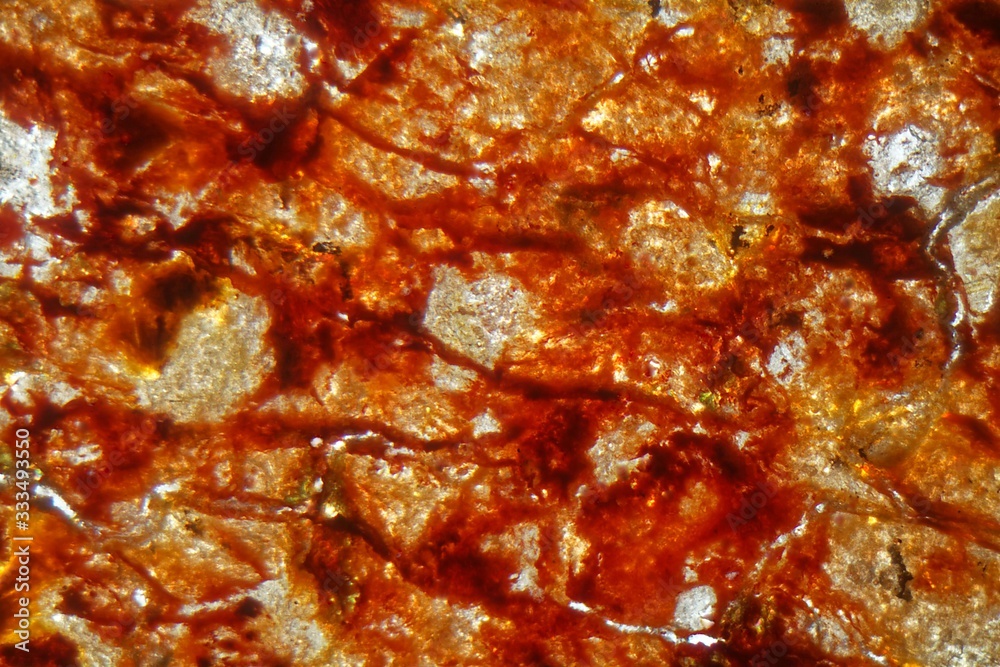 Petrographic thin section of an iron rich laterite soil. Petrographic thin section of an iron rich laterite soil.