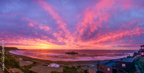 Panorama of Violet - purple sunset over the shore photo