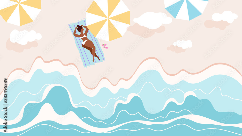 Woman sunbathing on the sea shore. Waves beating, white clouds in the air. Top dow view. summertime and travel concept. Woman sunbathing on the sea shore. Waves beating, white clouds in the air. Top dow view. summertime and travel concept.