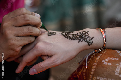 Henna tattoos for Indian brides and bridesmaids.