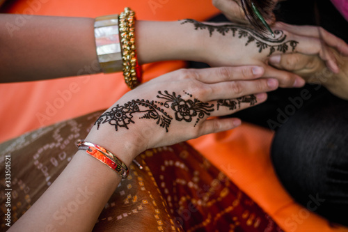 Henna tattoos for Indian brides and bridesmaids.