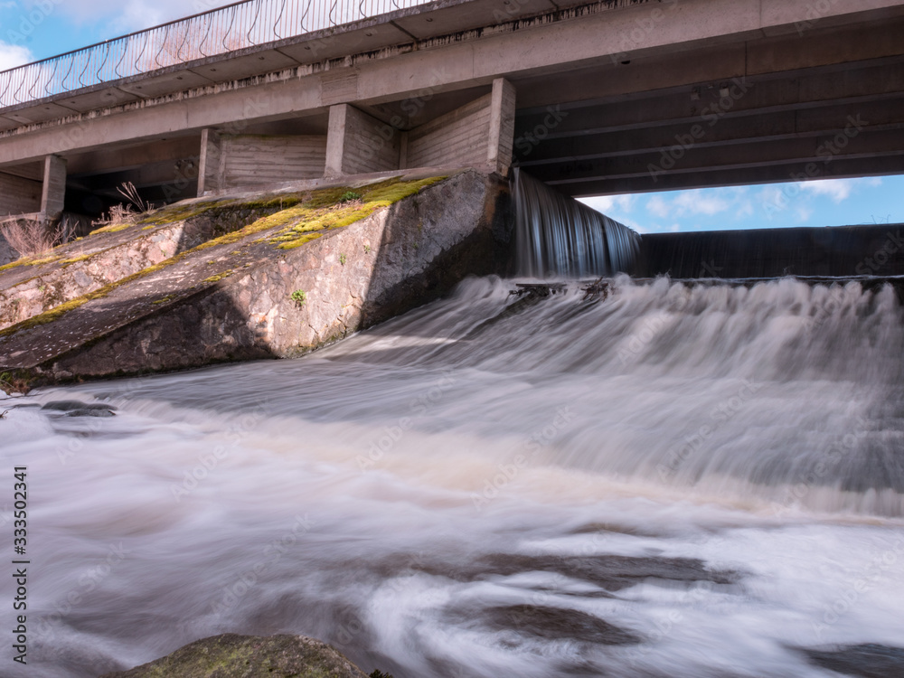 Obraz premium landscape with bridge and waterfall