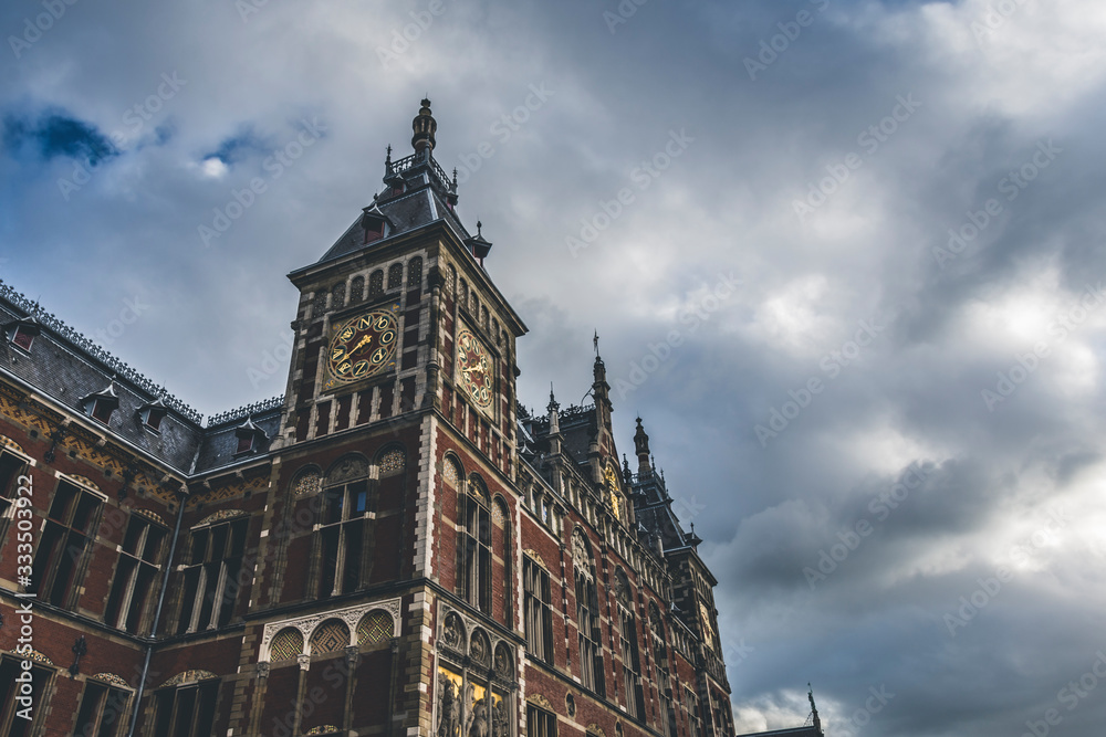 Amsterdam central station, tourist square with a marked sky
