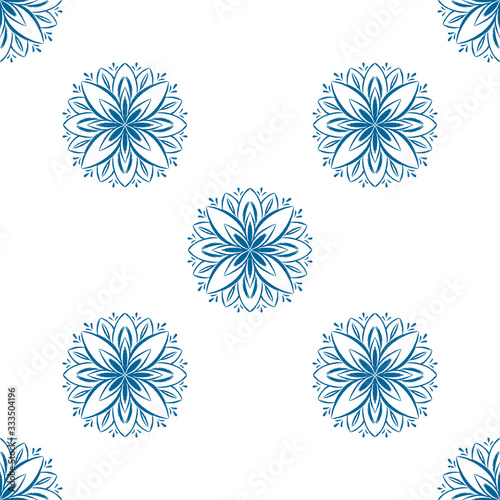 Blue mandala seamless pattern design. Doodle flower illustration.