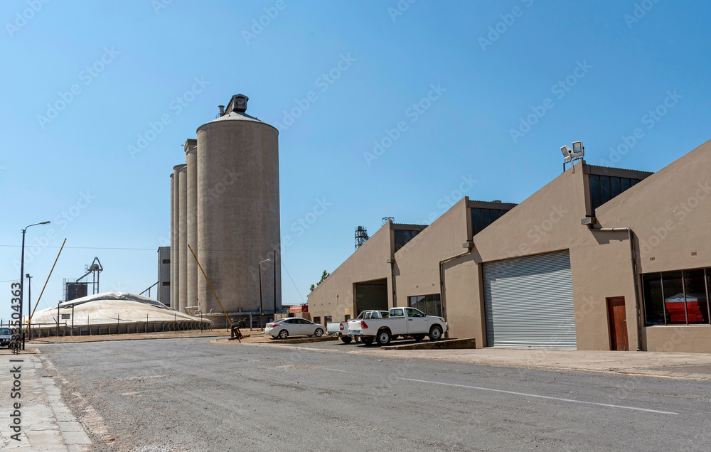 Caledon, Western Cape, South Africa. Dec 2019. Large concrete grain silos on the edge Caledon town centre, located in the Overberg region. South Africa. Caledon, Western Cape, South Africa. Dec 2019. Large concrete grain silos on the edge Caledon town centre, located in the Overberg region. South Africa.