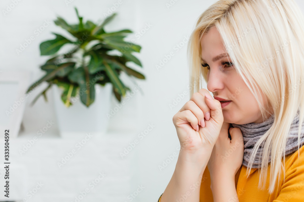 Closeup portrait of unhealthy young European blonde woman coughing a lot, suffering with cough, has a chest pain/ Sick desperate female has flu/Cold, sickness, bronchitis concept/Fit of coughing Closeup portrait of unhealthy young European blonde woman coughing a lot, suffering with cough, has a chest pain/ Sick desperate female has flu/Cold, sickness, bronchitis concept/Fit of coughing