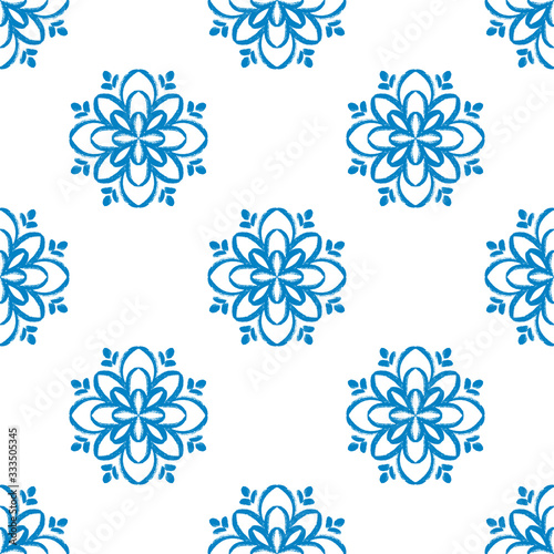 Blue mandala seamless pattern design. Doodle flower illustration.