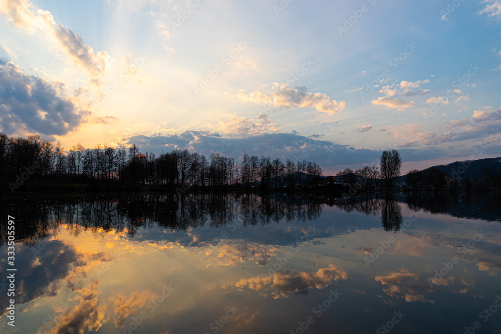 Fototapeta premium sunset over lake