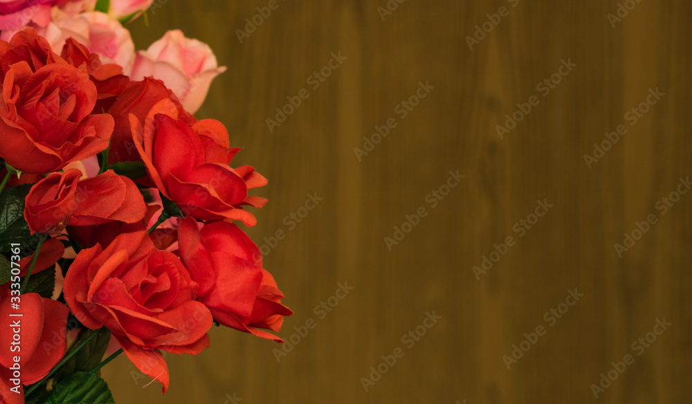 Rose flower with wooded texture background