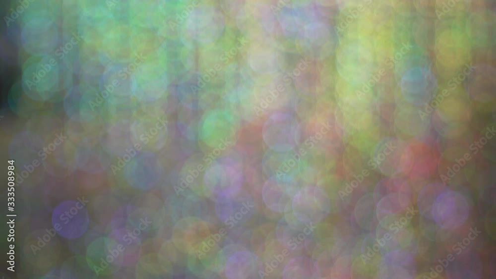 Blurry bokeh with bright colors from glittering materials and lights. Blurry bokeh with bright colors from glittering materials and lights.