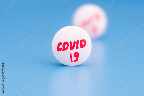tablet with the inscription "covid-19". medicine for coronavirus, concept.