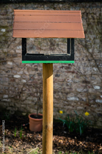 Rustic birdhouse in a garden