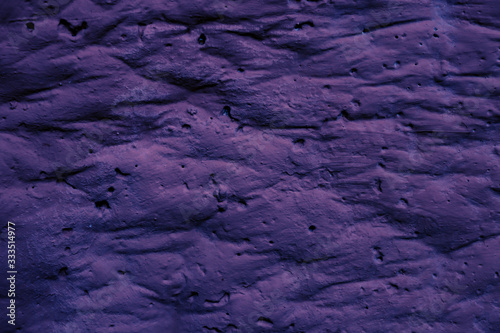 Background of violet slightly swollen surface.