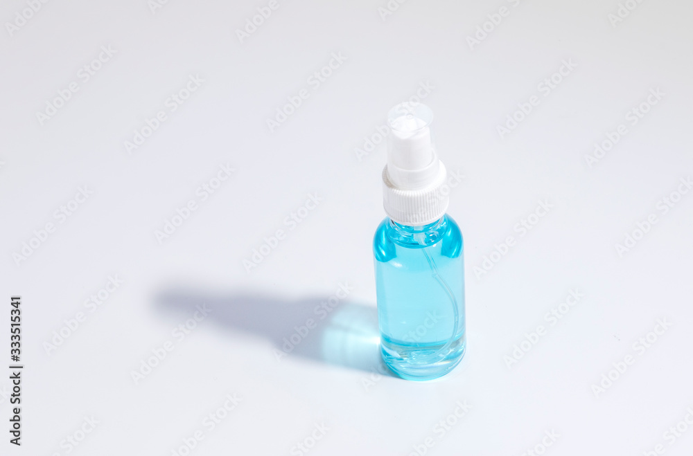 Sanitizer bottle on white blackground for washing hands to stop spreading,outbreak coronavirus covid-19 for public health safety.It's personal crisis management item.Selective focused blurred backgrou Sanitizer bottle on white blackground for washing hands to stop spreading,outbreak coronavirus covid-19 for public health safety.It's personal crisis management item.Selective focused blurred backgrou