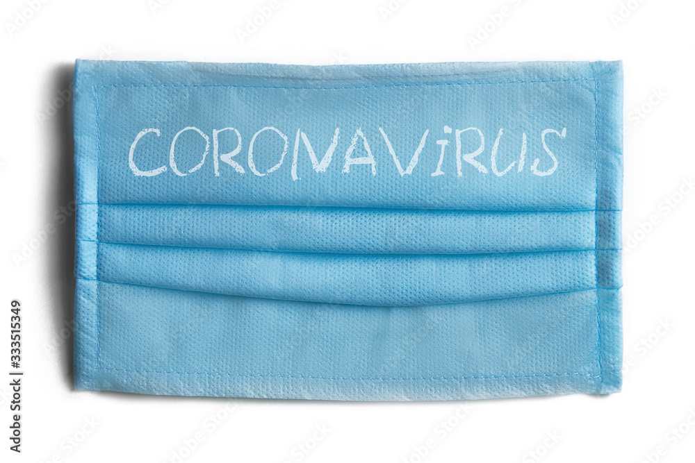 Fototapeta premium Coronavirus protection, virus protection. COVID-19. medical mask .Surgical Ear-Loop Mask on White.