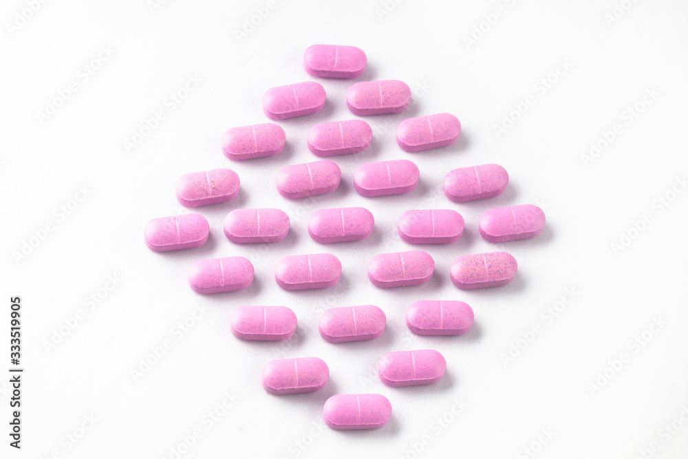 medicine tablets arranged on white background medicine tablets arranged on white background