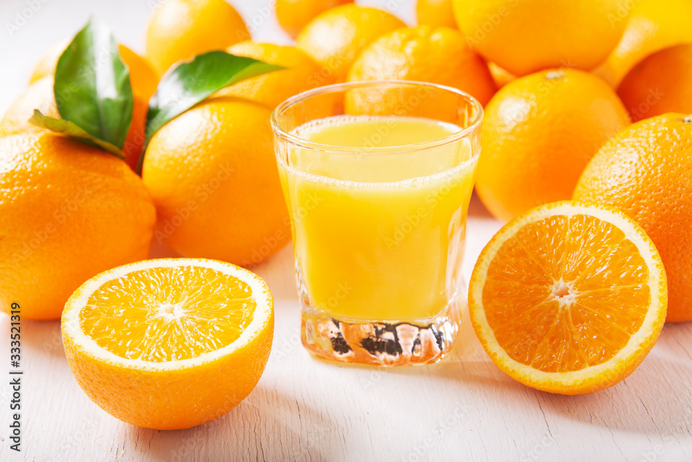 glass of fresh orange juice with fresh fruits glass of fresh orange juice with fresh fruits