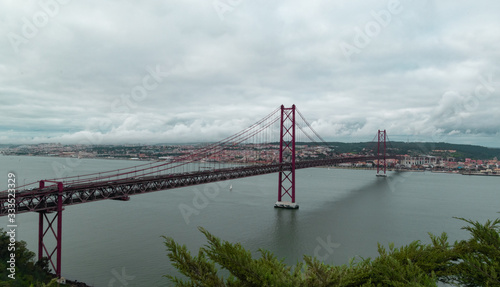 View of 25th April Bridge, from Christ the King Monument. Lisbon, Portugal