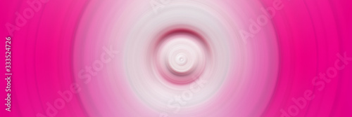 Abstract pink background. Pink concentric circles. Glow in pink space.