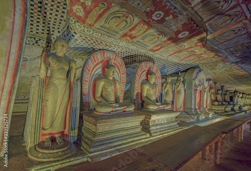 5th Century Dambulla Cave Temple And Statues In Dambulla  Sri Lanka. Dambulla Cave Temple Is The Largest And Best Preserved Cave Temple Complex In Sri Lanka  With Computer Color Effects 