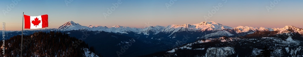 Beautiful Aerial Panoramic View of Canadian Mountain Landscape during a colorful sunset. Taken in Squamish, North of Vancouver, British Columbia, Canada. National Flag Composite