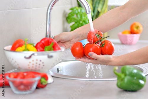 Washing vegetables.