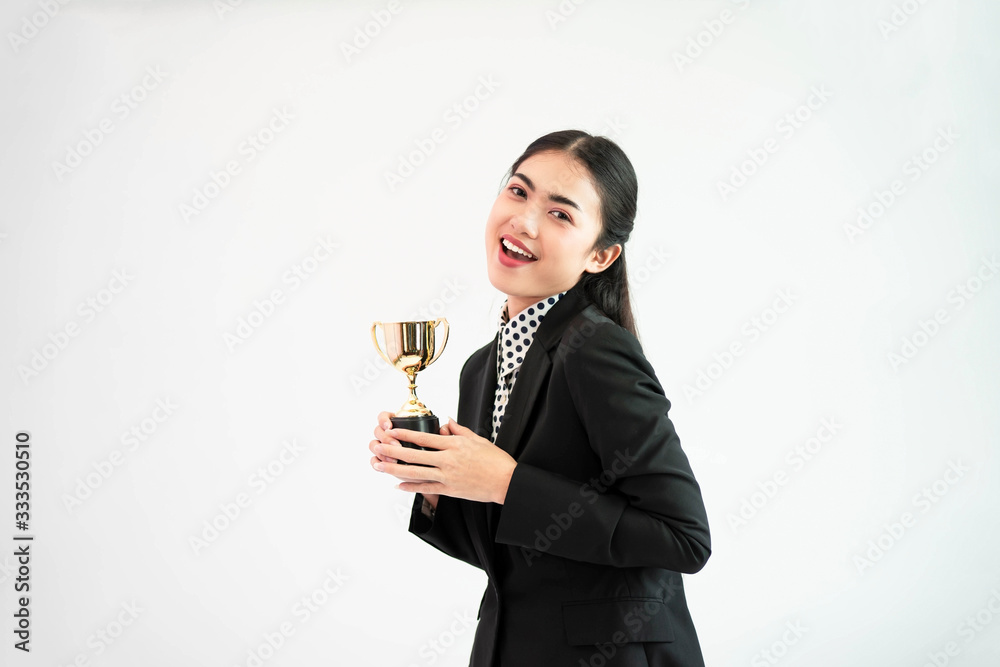 Businesswoman get award success winner and holding trophy on white background Businesswoman get award success winner and holding trophy on white background