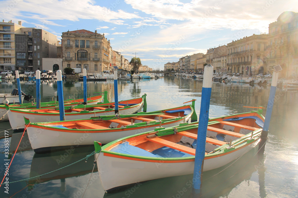 Colorful traditional wooden boats in Sete, a seaside resort and singular island in the Mediterranean sea, it is named the Venice of Languedoc Rousillon, France