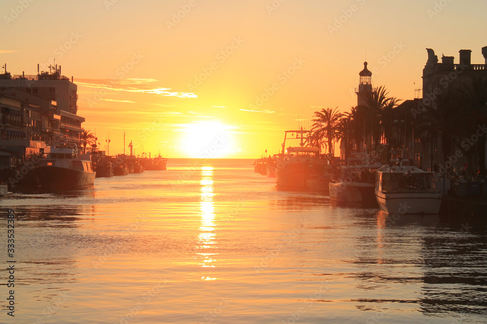 Fototapeta premium Amazing sunset in Le Grau du Roi, a seaside resort on the coast of occitanie region in France