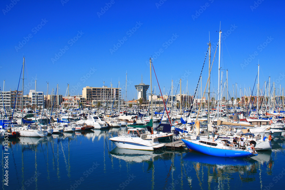 Marina and the lighthouse of the Mediterranean, an ancient water tower in Palavas les flots, a seaside resort of the Languedoc coast in the south of Montpellier