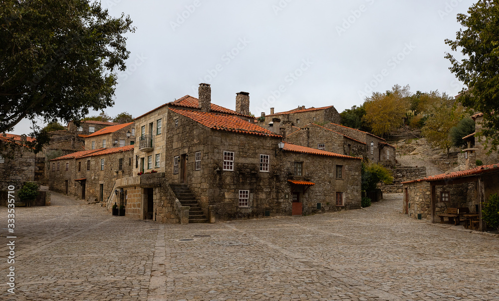 Historic village of Sortelha on a very cloudy day. It is one of ...