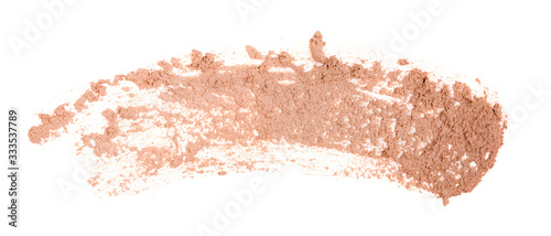Smeared make-up foundation bb-cream smudge powder creamy texture. Face skin concealer nude color on white isolated background.