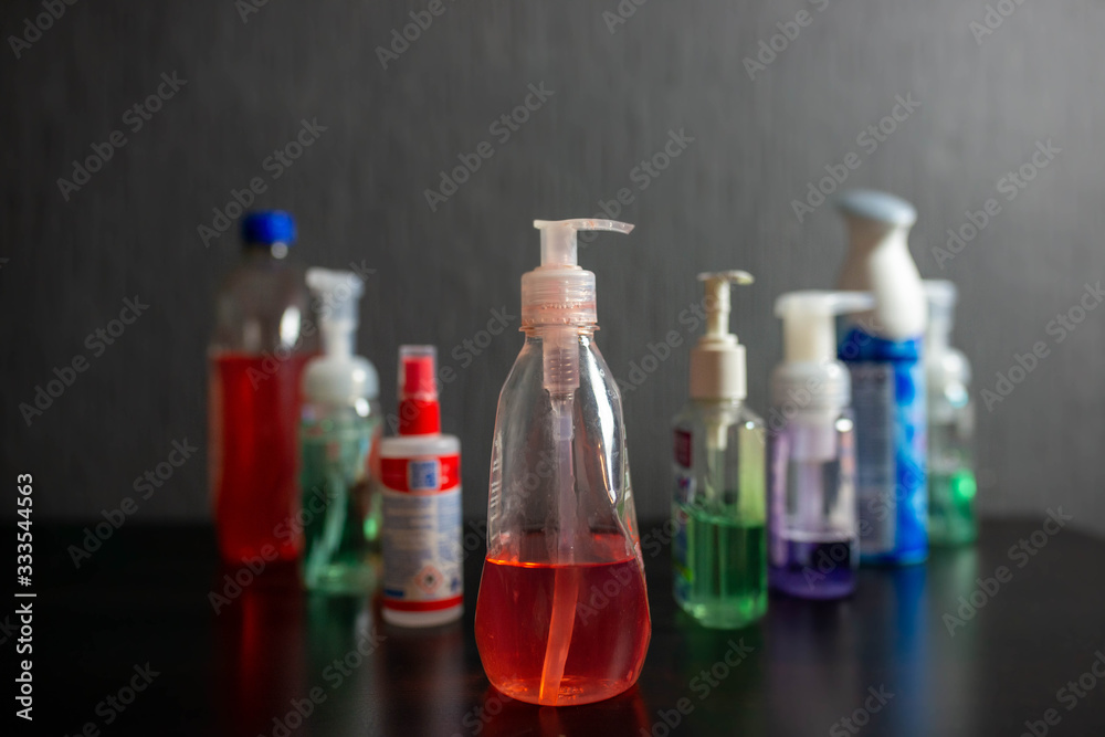stack of soaps and disinfection standing next to each other stack of soaps and disinfection standing next to each other