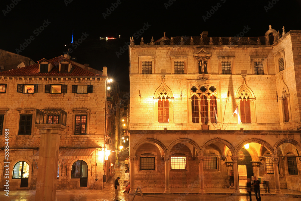 Sponza palace and Clock tower in Old town of Dubrovnik, Croatia, night photograph