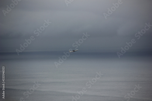  an airplane over the sea