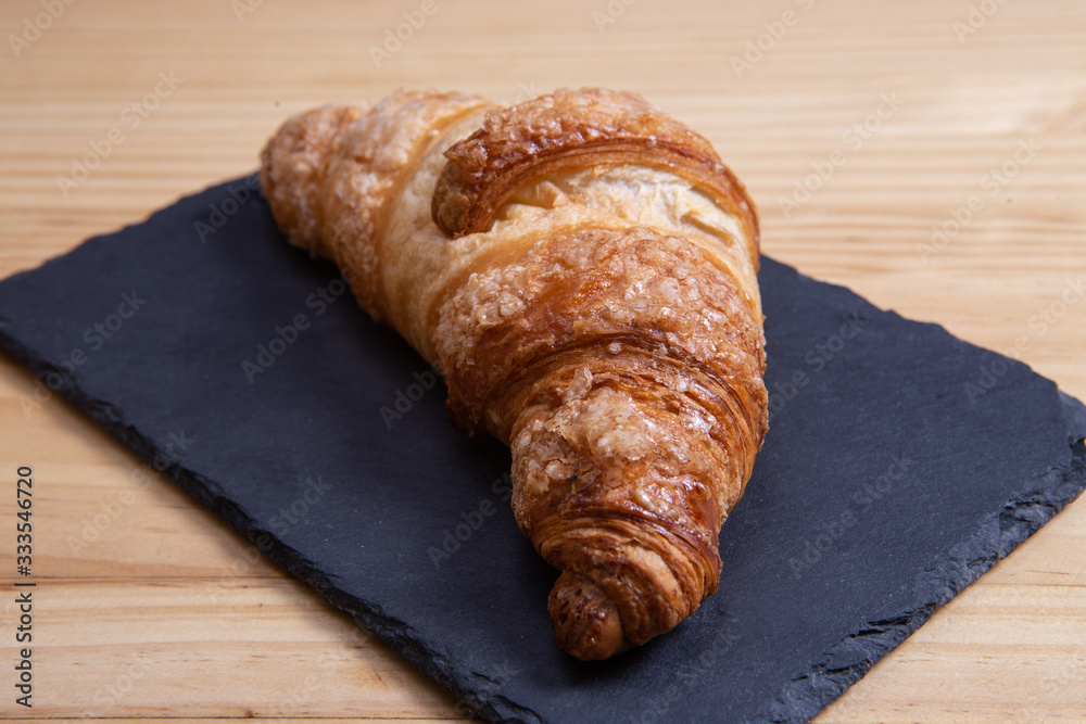 HomeMade croissant on the plate. HomeMade croissant on the plate.