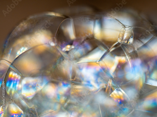 abstract macro of soap bubbles with colorful reflection of light